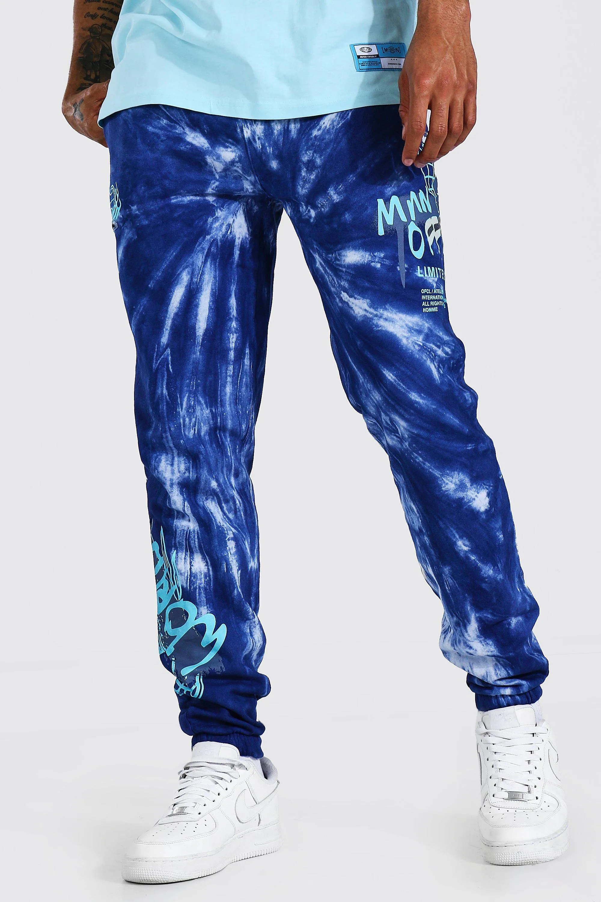 Regular Worldwide Graffiti Tie Dye Joggers | boohooMAN UK