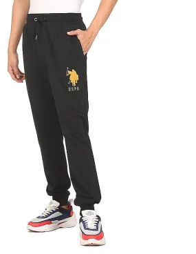 U.S. Polo Assn. Men Black Mid Rise Solid Joggers